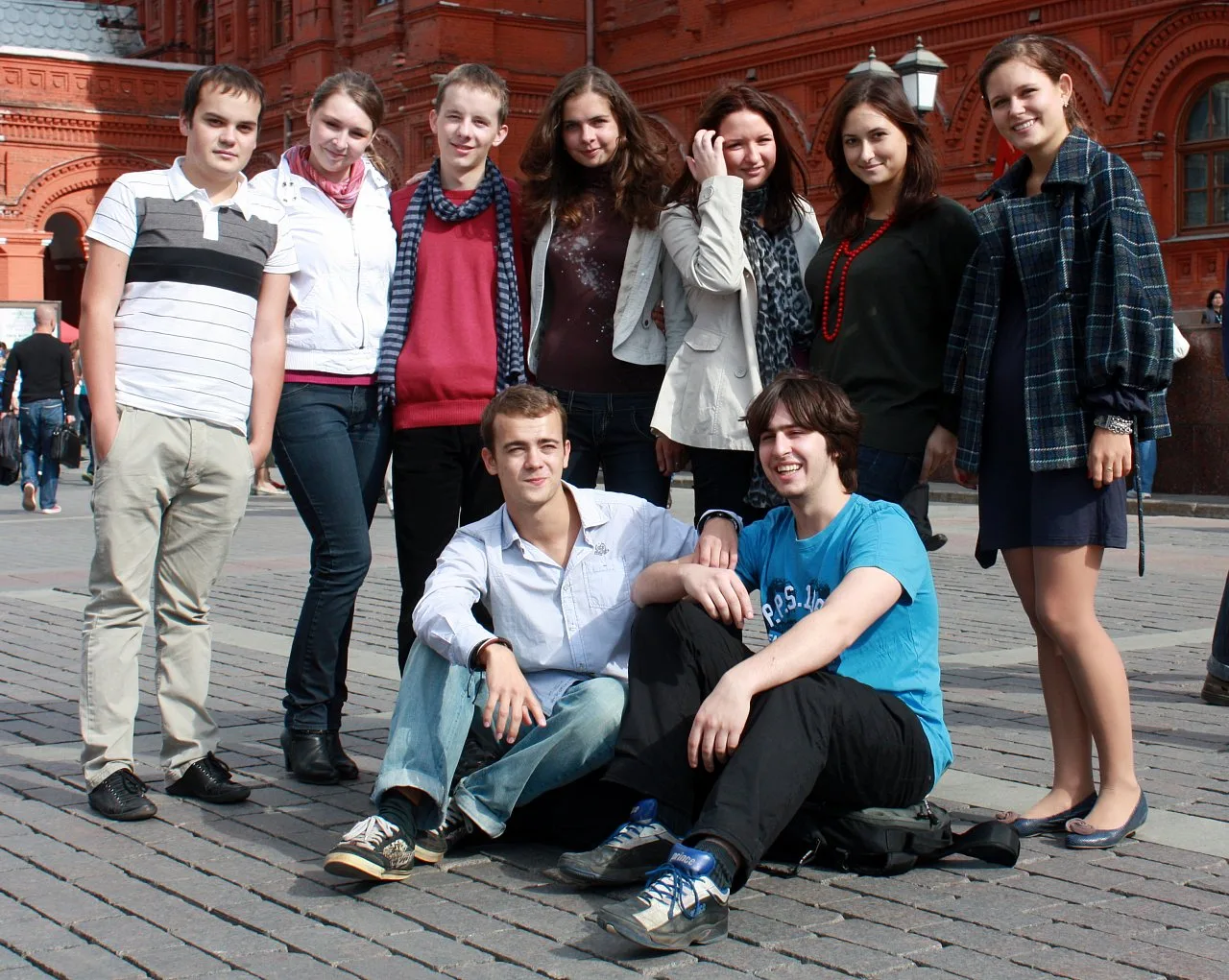 A group of friends on the cobbles by the Historical Museum in central Moscow. Photo: Vlad Lario.
